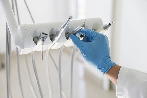 Professional Tooth Extraction technician working in Weidman, MI